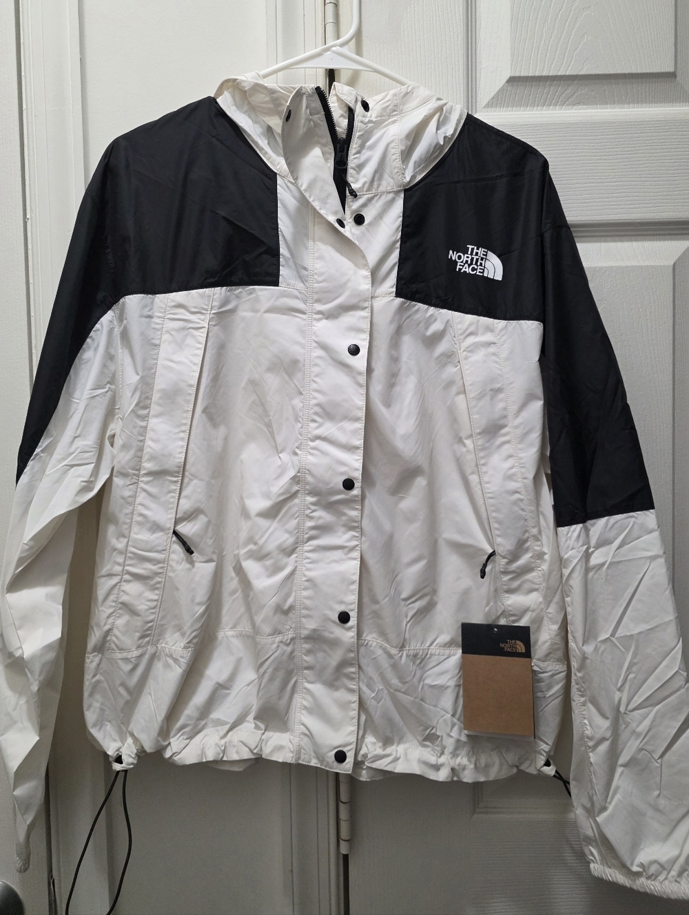 The North Face Women's White and Black Waterproof Windbreaker Jacket